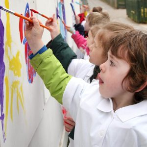 Children painting wall