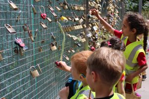 Children looking at lock gate