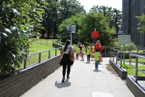 Children walkin gup hill to Sport centre