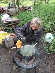 Cooking the stinging nettle soup