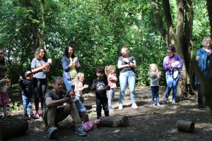 Families gather around time capsule