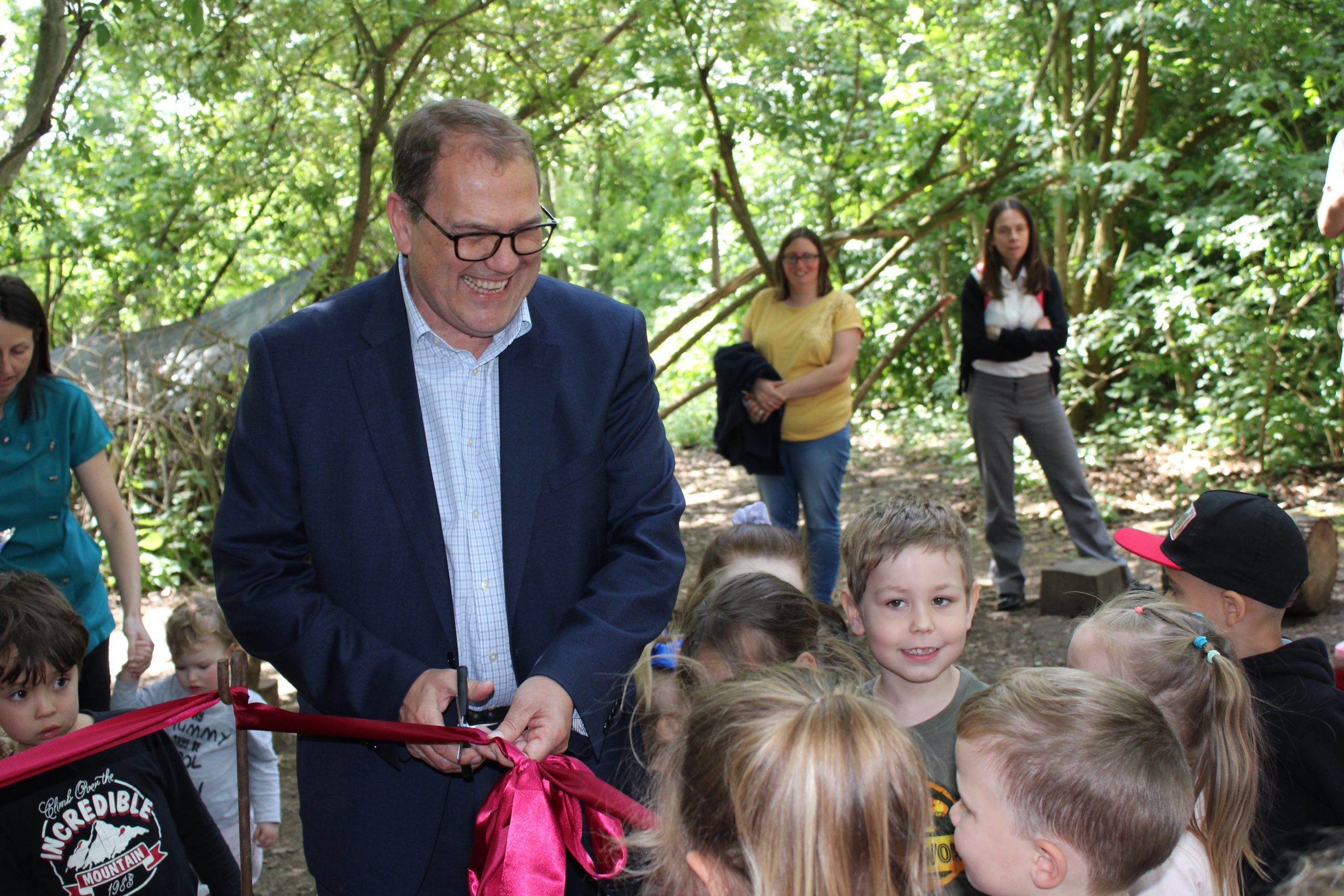 Brynn Morris cuts the ribbon